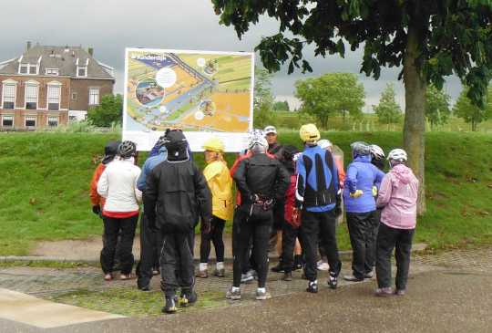 Examining our Kinderdijk route, hoping we stay dry.